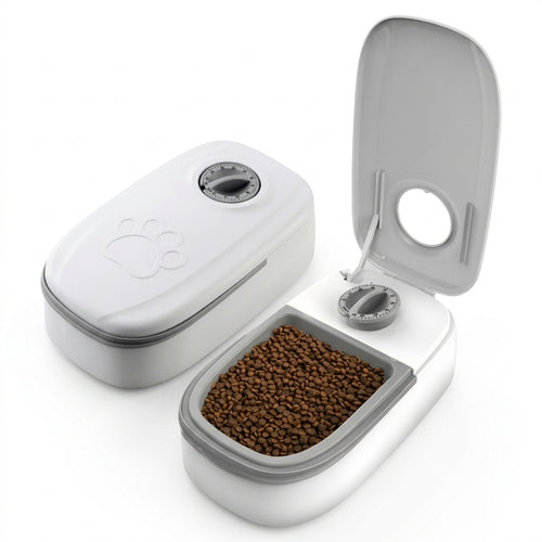Comedero programable automático blanco con temporizador de perilla y tapa abierta con croquetas
